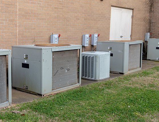 Row of commercial condensing units installed by Nick Badame Refrigeration